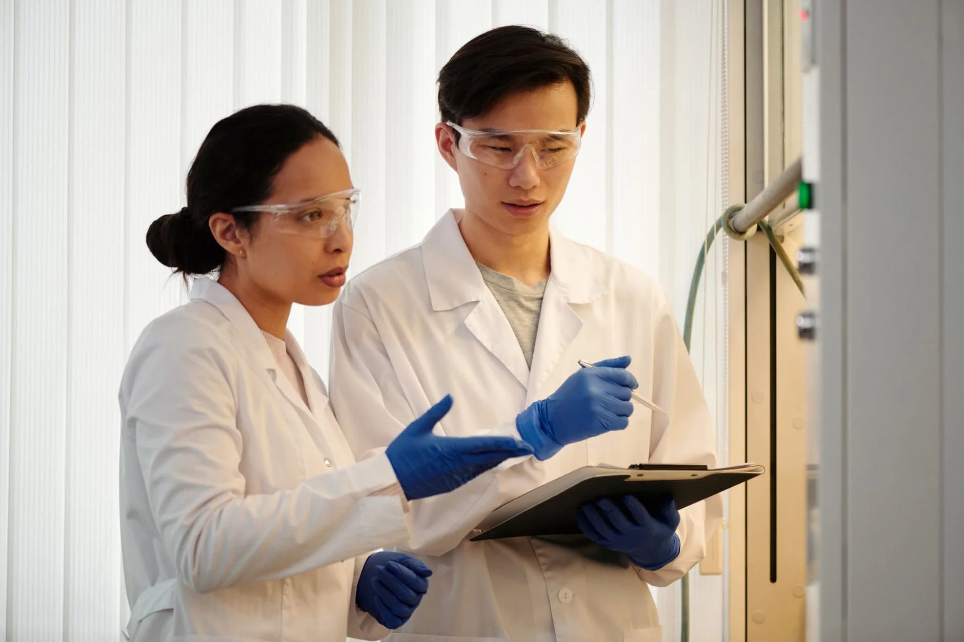 Pakistan-trained research professional reviewing publications, methods and New Zealand PhD or employment pathway planning