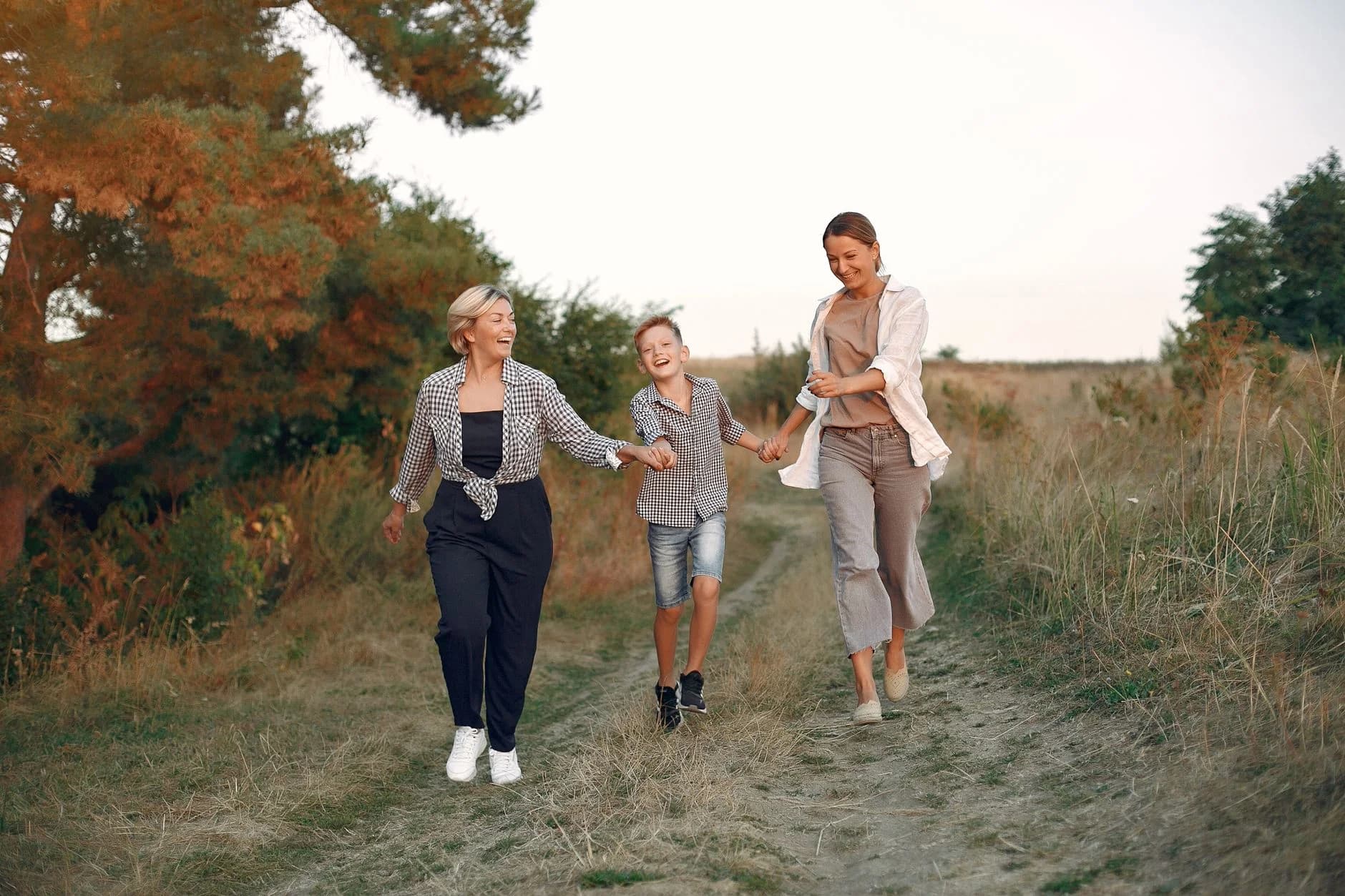 Multi-generational family outdoors planning a household future in New Zealand context